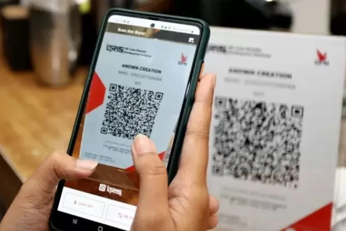 Ilustrasi pembayaran menggunakan QRIS.