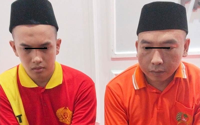 Dua terdakwa kasus dugaan peredaran narkotika, Mohammad Eriyan dan Herawansyah, mengikuti sidang perdana secara virtual melalui Zoom di Pengadilan Negeri Nanga Bulik, baru-baru ini. (FOTO: IST)